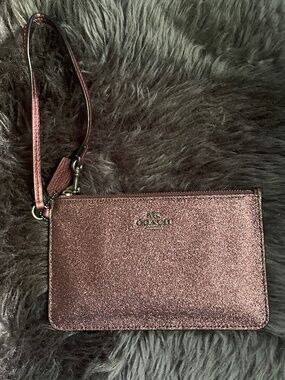 Coach sparkly dark pink wristlet